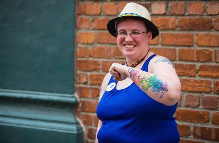 a person wearing a hat and glasses