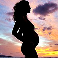 22 pregnant-woman-on-beach-at-sunset-m-swiet-productions