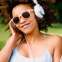 thumb woman with headphones summer playlist