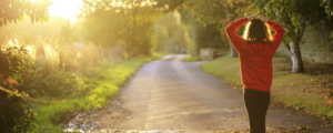 Woman Walking on Path