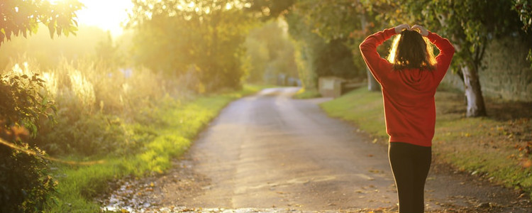 Woman Walking on Path