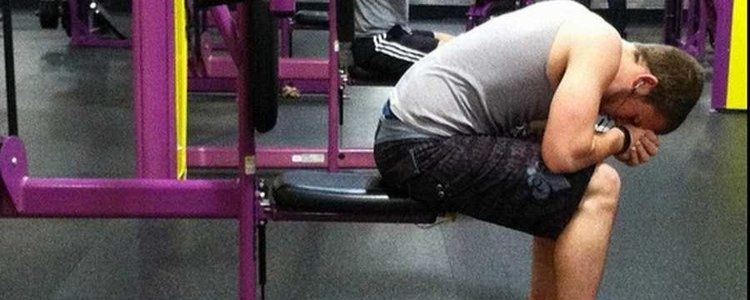 sad person at gym stock