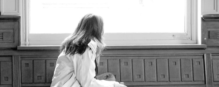 Girl Looking Out Window
