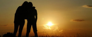 Sunset People Hugging