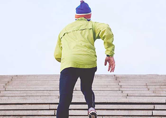 Athlete runnning up steps. Athletes annd eating disorders