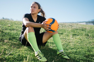 Woman holding soccer ball