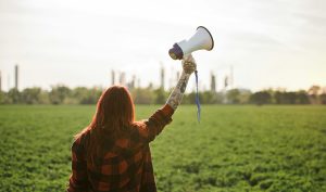 Woman with bullhorn