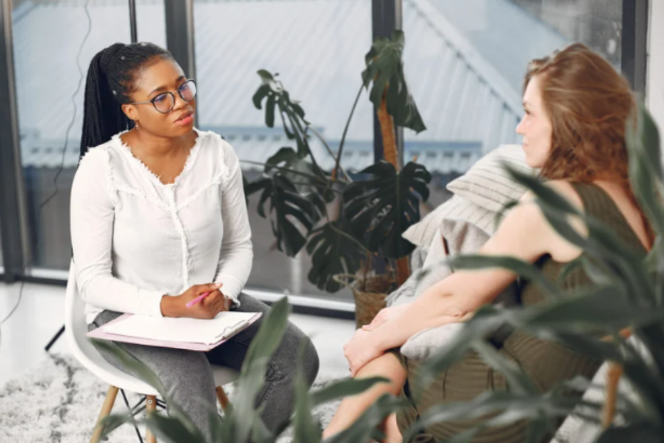 Mother talking with her therapist about her eating disorder