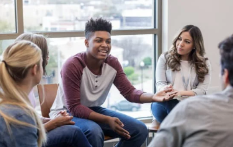 High school students talking with peers